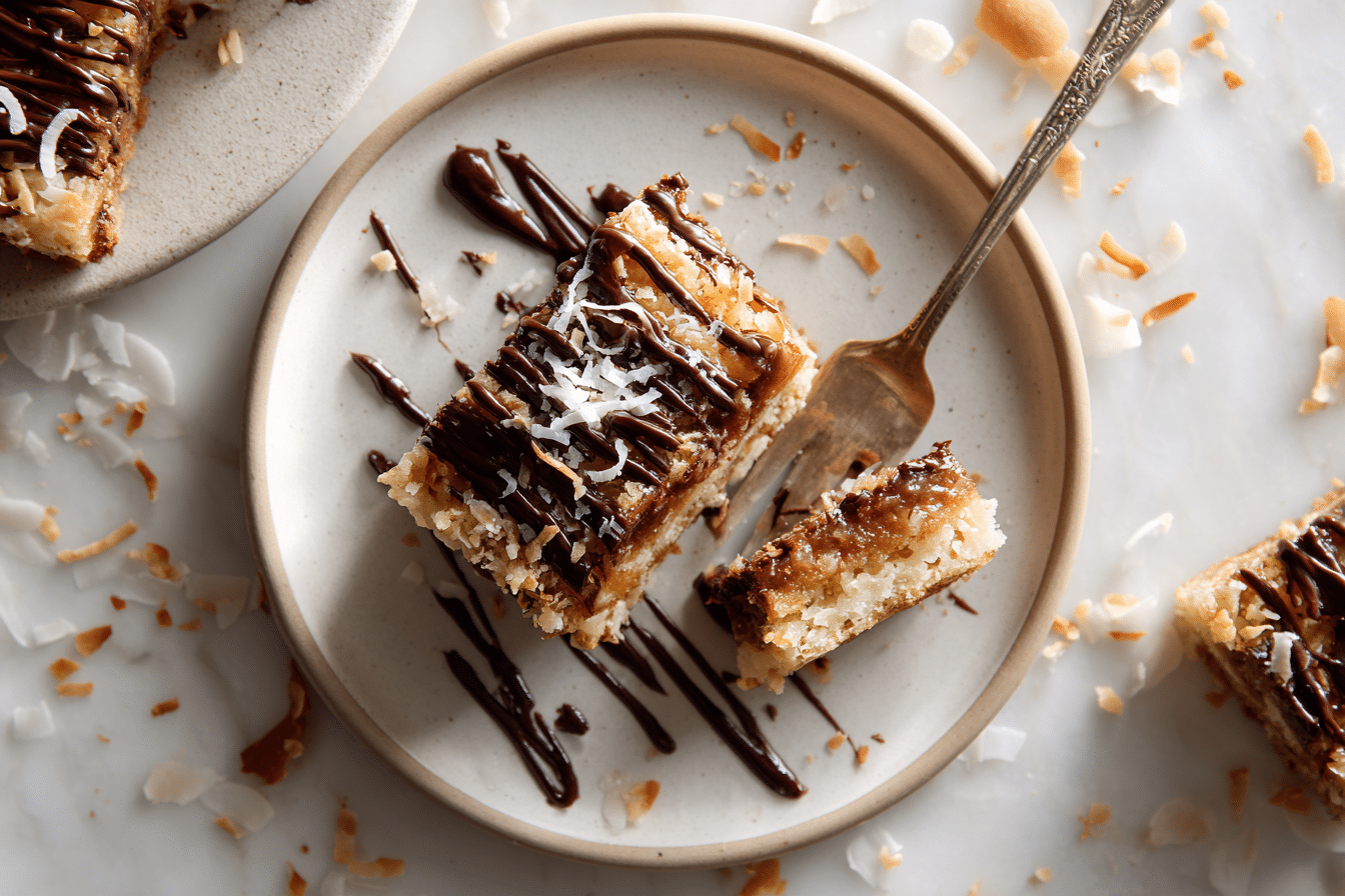 Samoa Cookie Bars with Caramel Coconut and Chocolate serving image